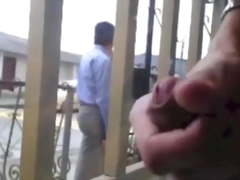 Exhib boys playing in front of the window